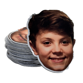 Stack of custom printed stickers with a face portrait.